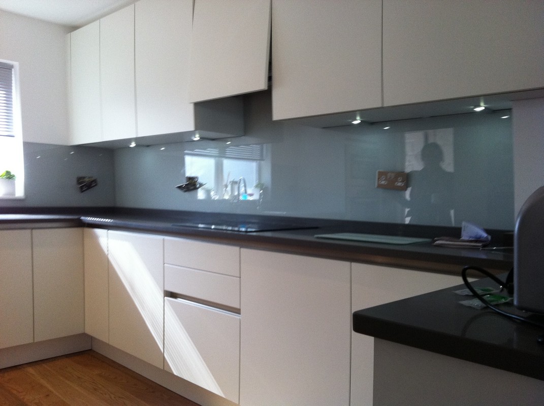 Grey glass kitchen splashback with LED lighting in Walthamstow