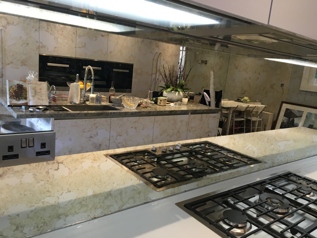Mirror glass splashback in Walthamstow luxury kitchen