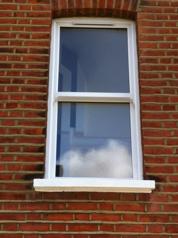 uPVC sash window on Victorian red brick house in Walthamstow